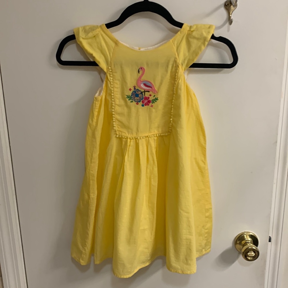 Les Elephants girl’s Yellow Dress with Flamingo Embroidery.